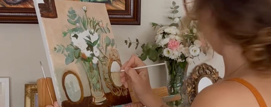 la escritora pintando un cuadro