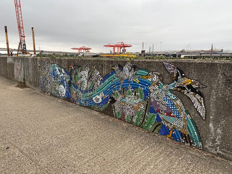 Photos of a painting, a mural, and two lampsades protruding from the river