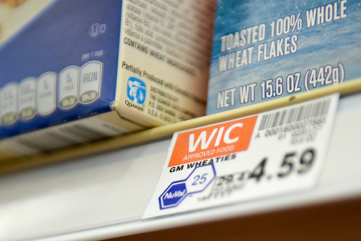 Items approved for the WIC program are labeled next to their price on the shelf.