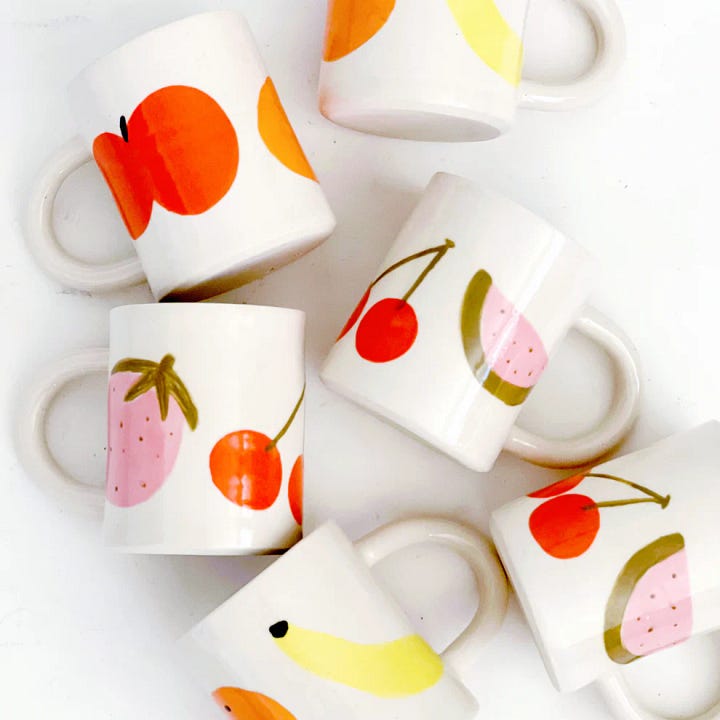 The left photo is a mug made by Bea Bellingham that says Fart Face. The right photo is a wood pigeon drawn by Natelle Quek.