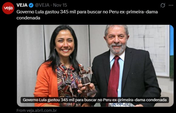 Screenshot of a Veja news article featuring a photo of Nadine Heredia smiling in an orange cardigan next to Luiz Inacio Lula da Silva in a suit and red tie, with headline about Brazilian government spending 345 thousand reais to fetch the convicted ex-first lady from Peru using a FAB plane.