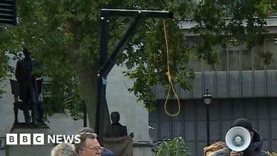 Arrest after mock gallows erected outside Houses of Parliament