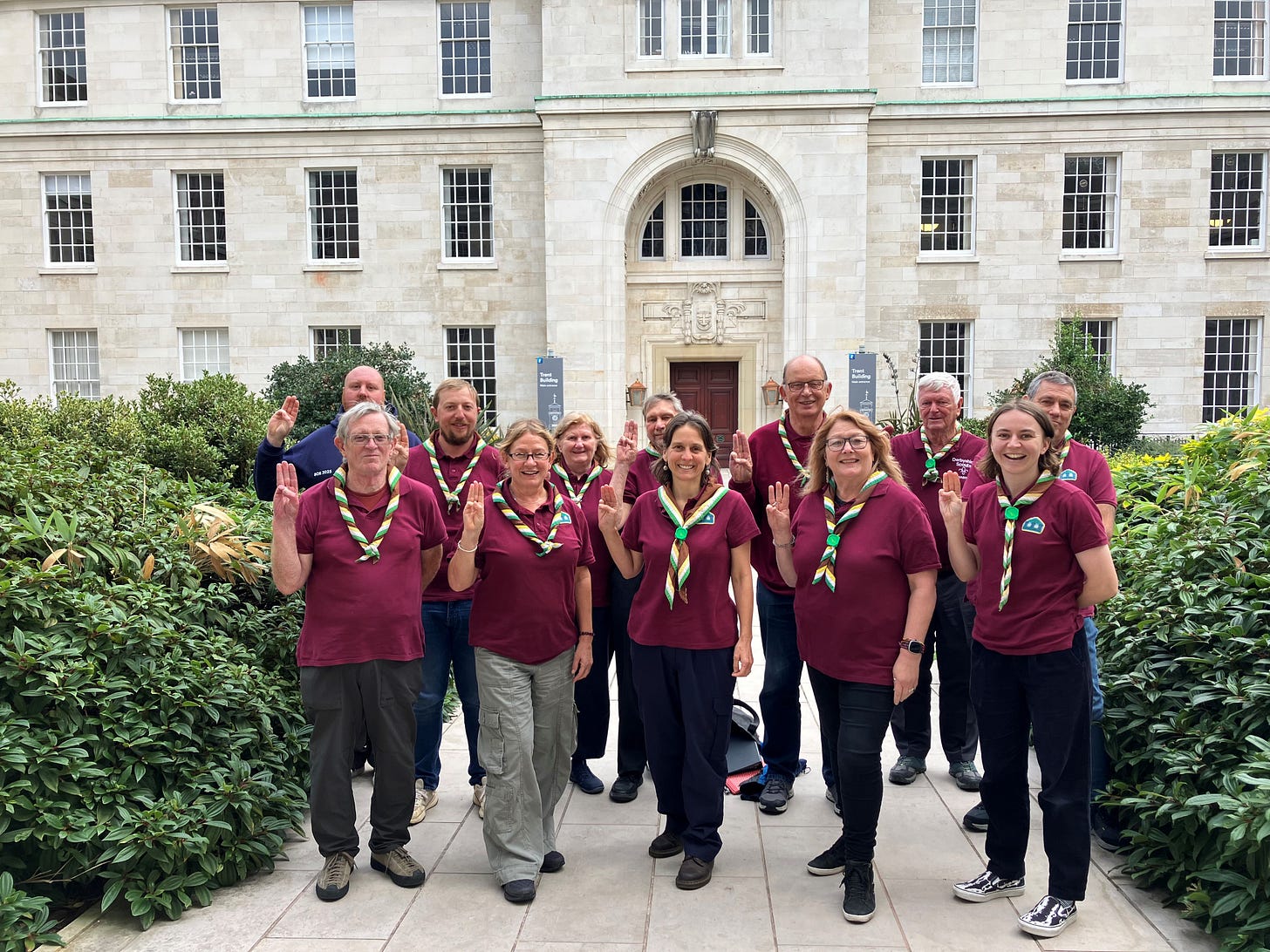 Derbyshire Scouts archaeology team in the courtyard of the Trent Building, wearing Scouts tops and neckerchiefs