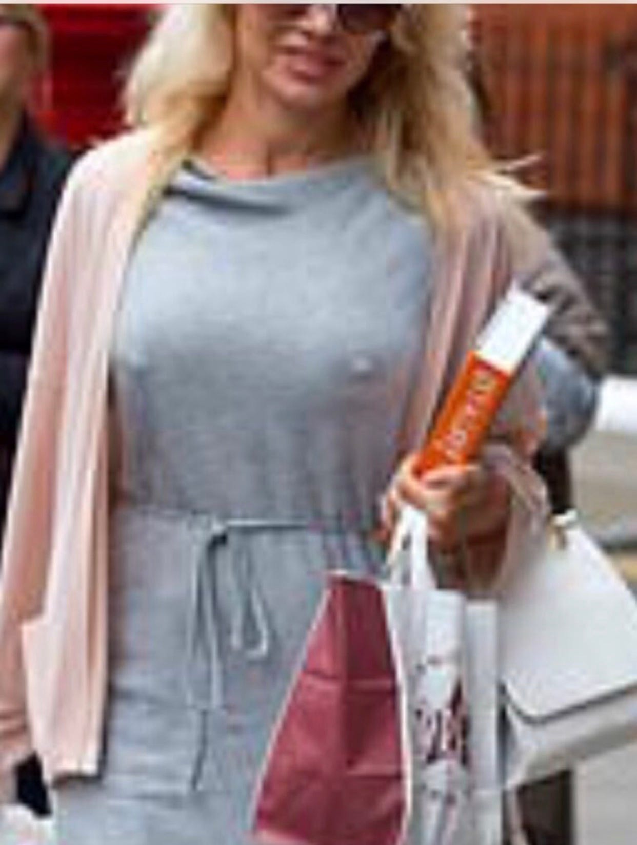 Pam Anderson on her way to the Embassy to see Julian Assange (.)(.)