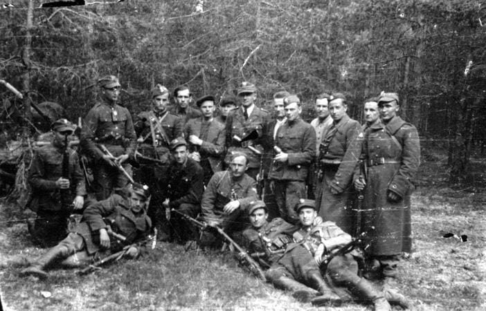 A clandestine Polish Home Army partisan unit operating deep in the woods near Antowil, Occupied Poland (now Lithuania), May 1944.
