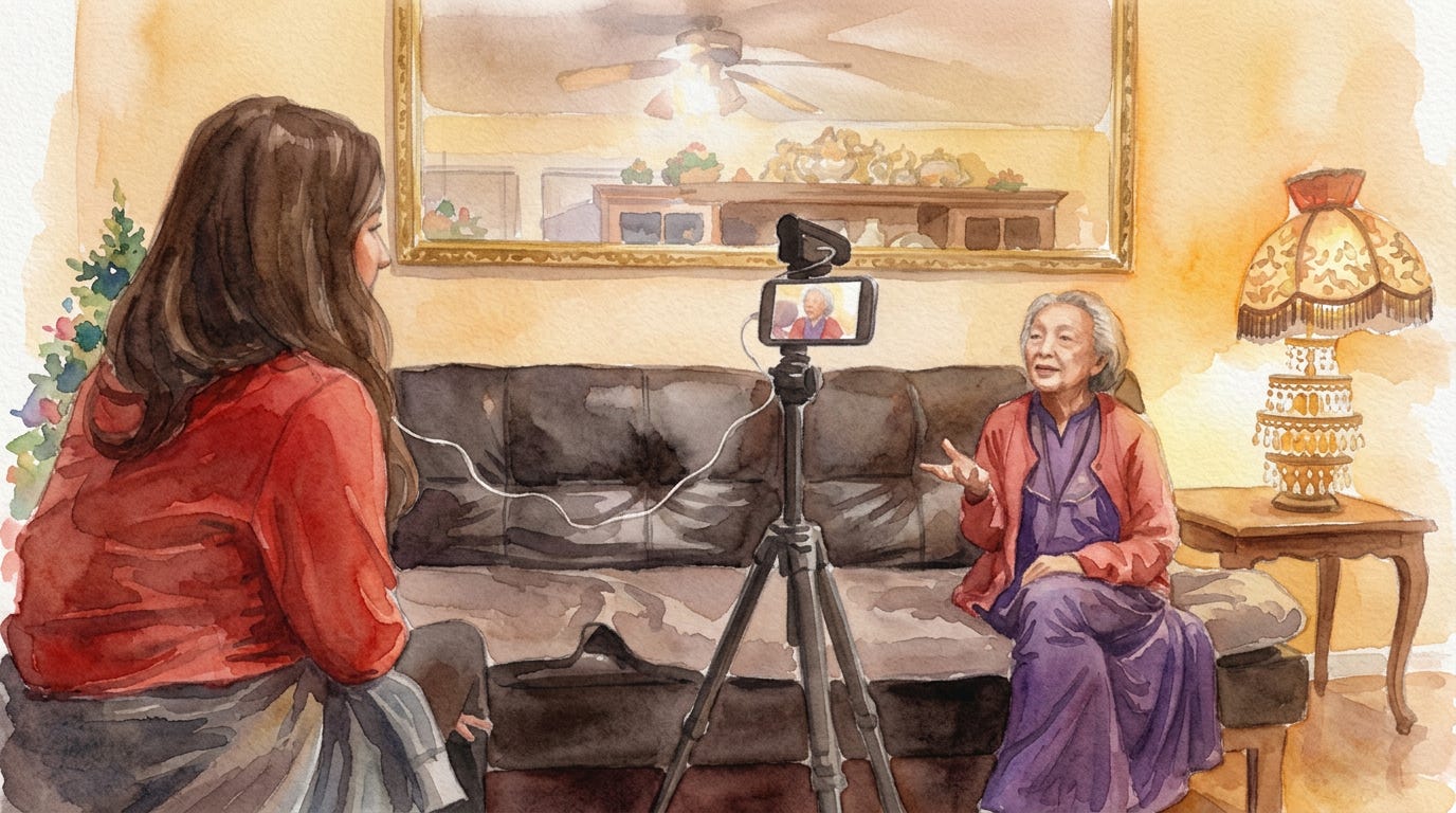 A cozy watercolor painting in warm yellow tones of a young woman with long dark brown hair, wearing a red sweater, sitting sideways on a dark gray couch in a vintage living room. She listens attentively through headphones connected to a smartphone on a tripod recording video. Across from her, an elderly Filipino grandmother in a purple robe with red jacket gestures animatedly with her hand raised, smiling warmly. Background includes a large ornate mirror reflecting a kitchen with jars, a ceiling fan, ornate lamp, plants, and wooden side table. A cozy watercolor painting in warm yellow tones of a young woman with long dark brown hair, wearing a red sweater, sitting sideways on a dark gray couch in a vintage living room. She listens attentively through headphones connected to a smartphone on a tripod recording video. Across from her, an elderly Filipino grandmother in a purple robe with red jacket gestures animatedly with her hand raised, smiling warmly. Background includes a large ornate mirror reflecting a kitchen with jars, a ceiling fan, ornate lamp, plants, and wooden side table.