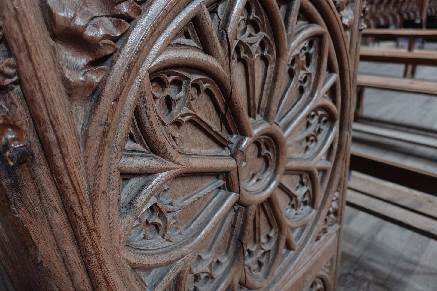  Intricate carvings on the wooden pews at La Chaise-Dieu, Auvergne, France 