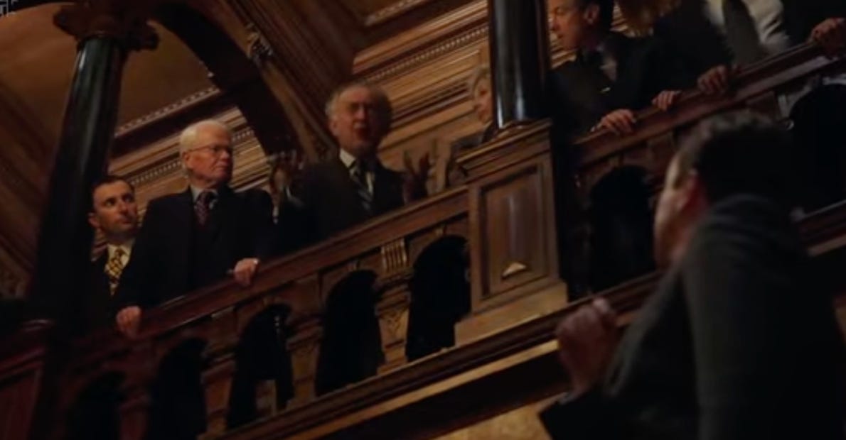 A group of people in suits

AI-generated content may be incorrect.