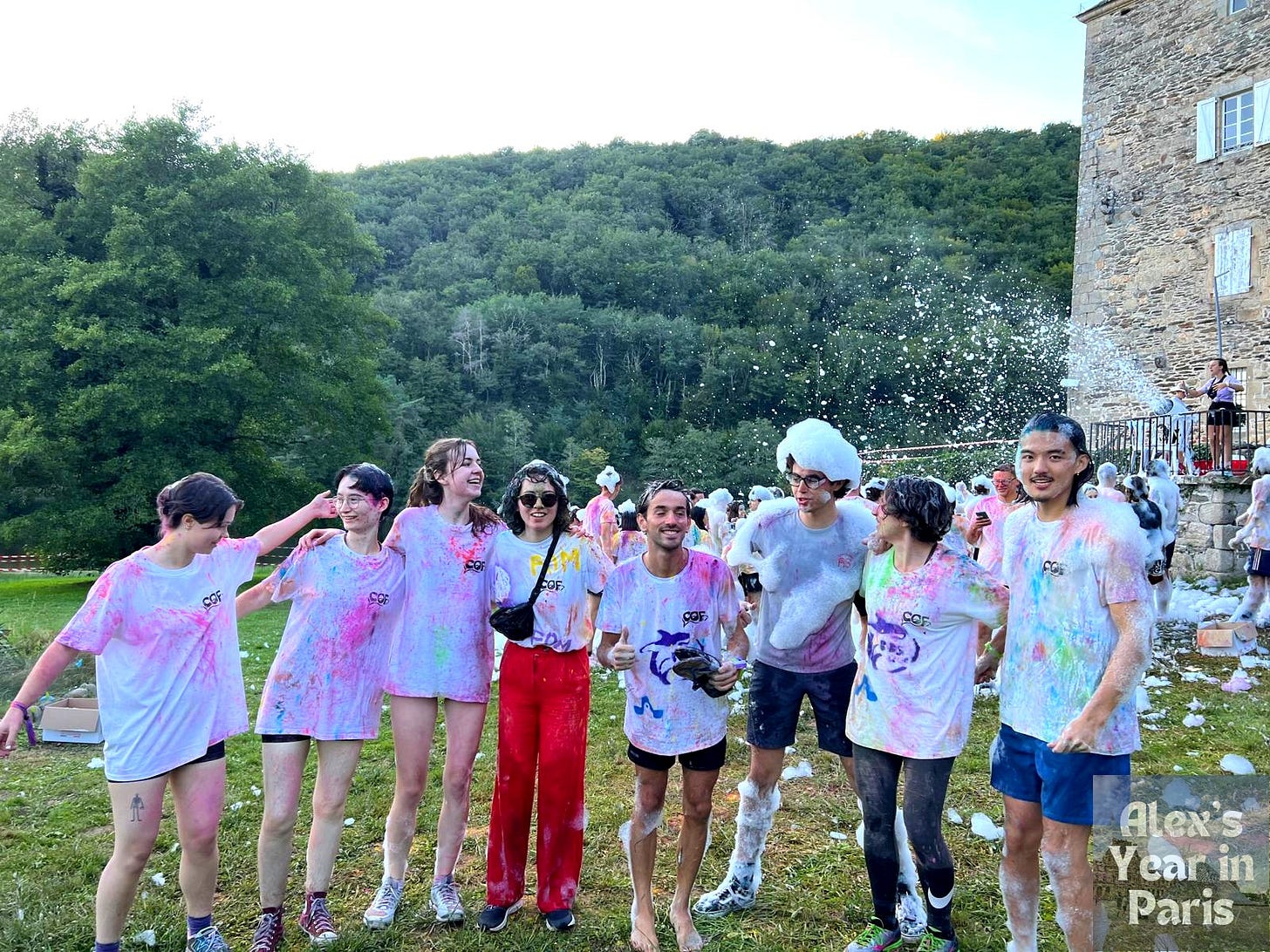 A group of ENS students covered in foam and paint
