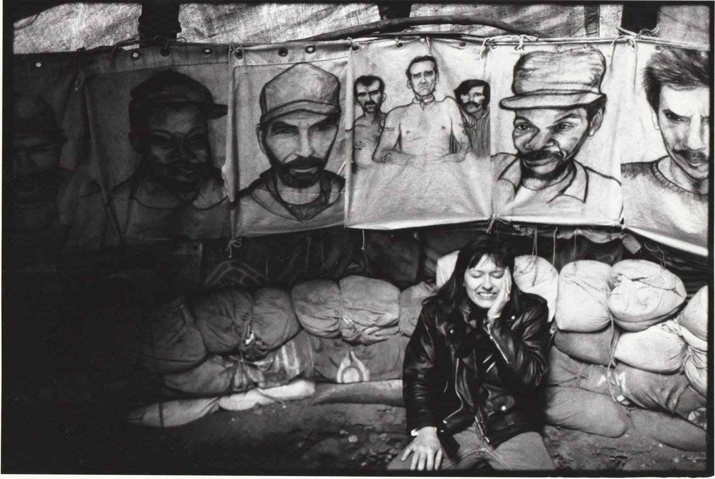 Photo of Gabriele sitting in the tipi surrounded by her portraits. Photo: Wendy Workman