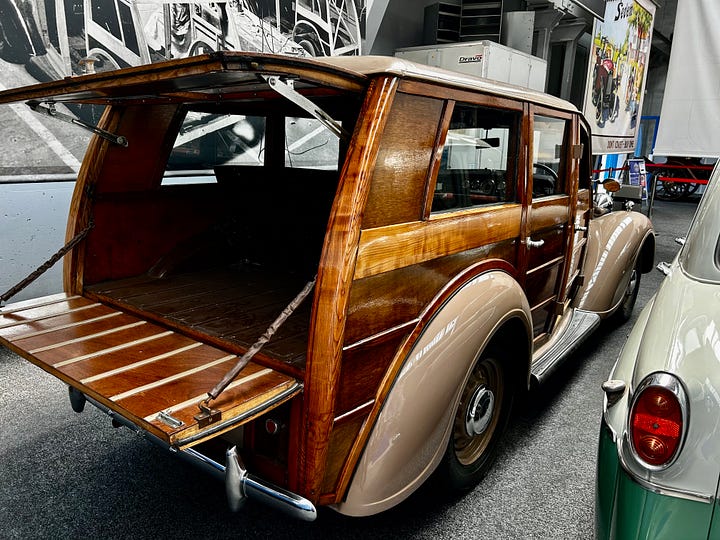 Two photos of a 1947 Austin Woody. The view from the front and rear. The distinctive wood side paneling gave it the name Woody. Image Roland's Travels 2023.