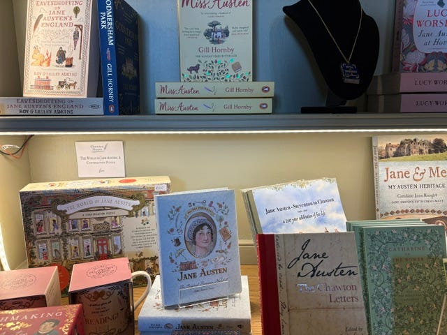 A collection of books about Jane Austen sit on a bookshelf at the gift shop of Chawton House. 
