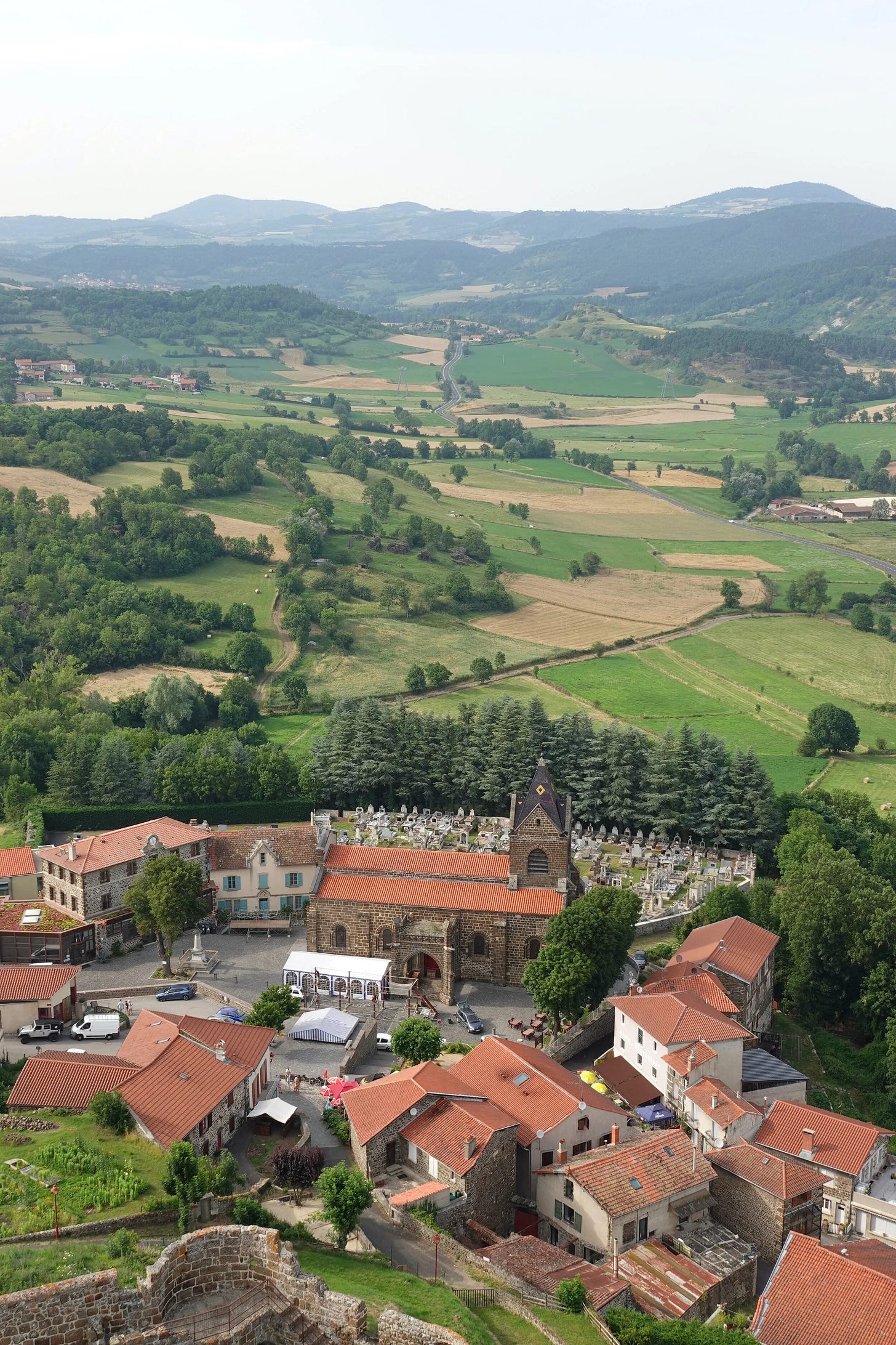 Panoramic view of Eglise de Saint Martin and Village of Polignac in Auvergne, France Panoramic view of Eglise de Saint Martin and Village of Polignac in Auvergne, France