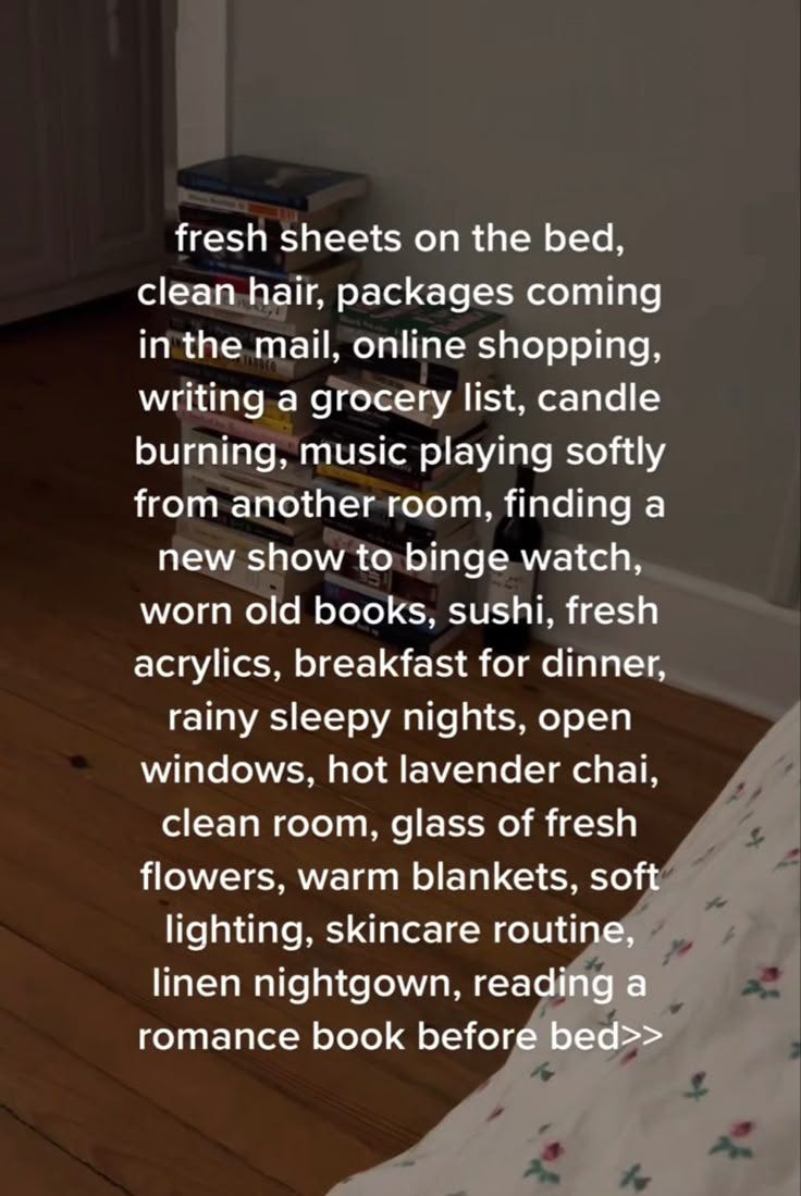 This may contain: a bed sitting on top of a wooden floor next to a window
