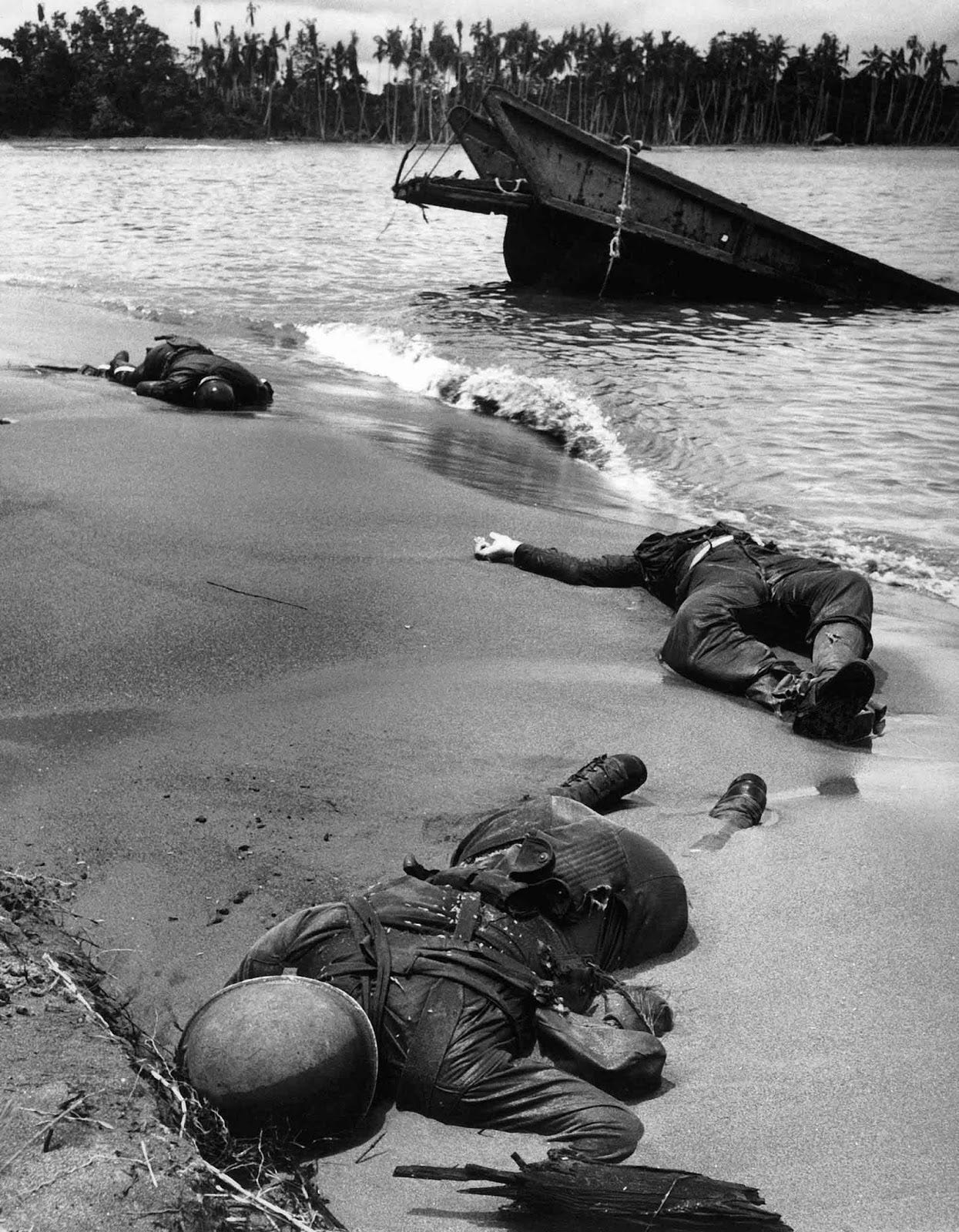 Three Dead Americans Lie on the Beach at Buna: Photo From 1943 - Rare Historical Photos Three Dead Americans Lie on the Beach at Buna: Photo From 1943 - Rare Historical Photos