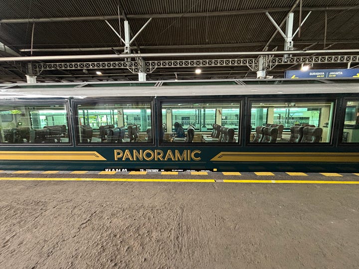 Panoramic class on the train from Yogyakarta to Surabaya in Indonesia