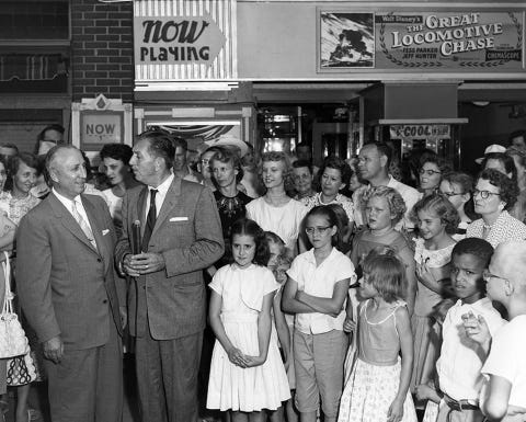 Walt and Roy Disney attend the Marceline premiere of The Great Locomotive Chase