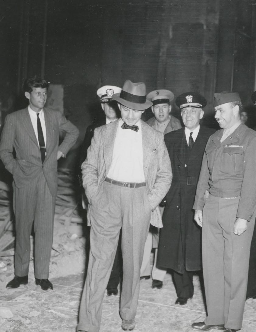 JFK viewing Hitler’s ravaged bunker with Secretary of the Navy James Forrestal and Ambassador Averell Harriman. The image captures JFK inside the ruins of the Nazi command world before he wrote his most famous reflection on Hitler’s future historical significance.