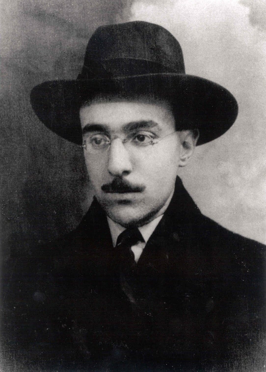 A black and white photograph of the poet and writer Fernando Pessoa. A black and white photograph of the poet and writer Fernando Pessoa.