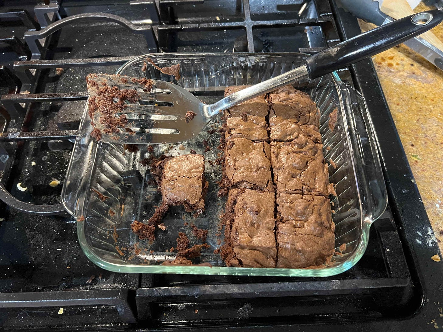 a half-eaten pan of brownies