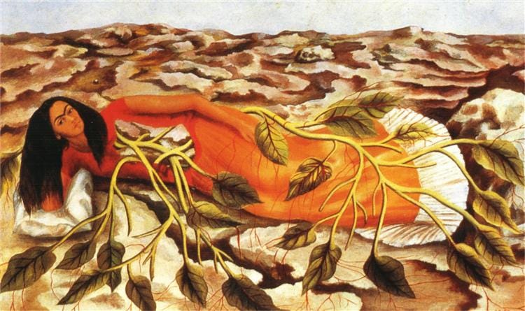 Frida Kahlo reclines on dry, rocky ground in an orange dress with a white ruffle, while the roots and branches of a leafy green plant grow through an opening in her torso