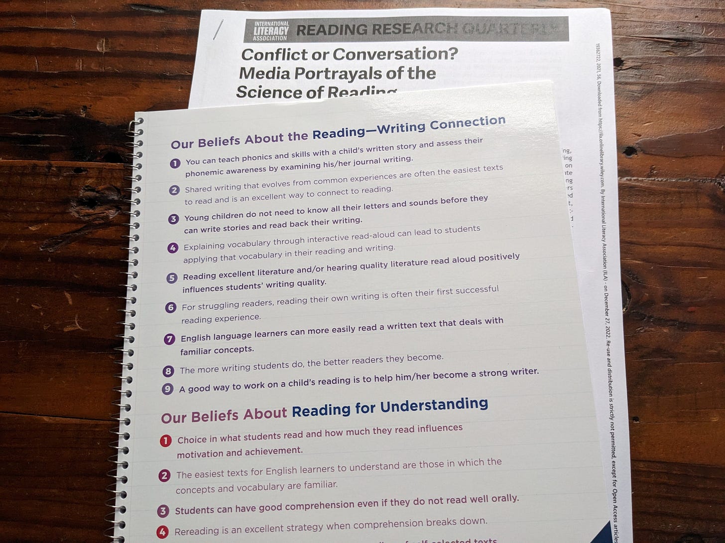 Image: A personalized school notebook with an article inside about literacy