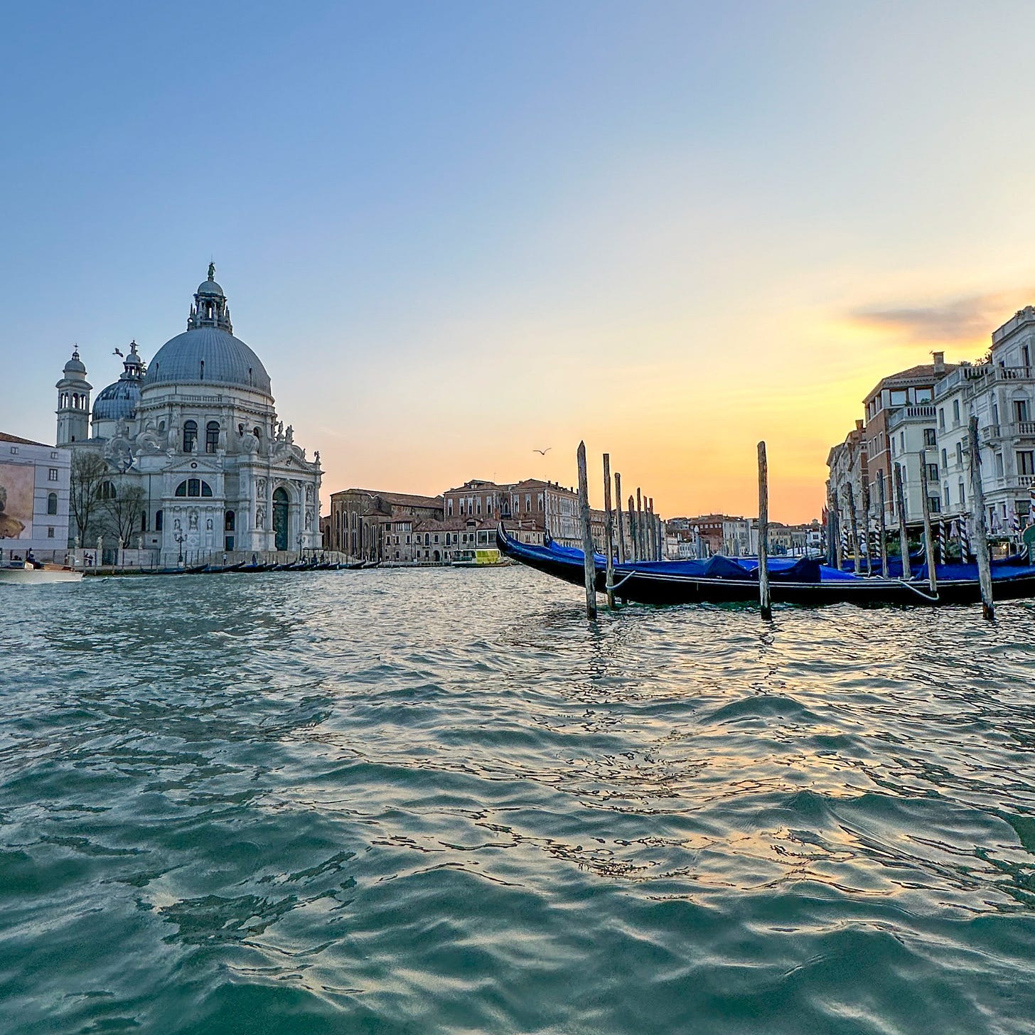 this is a picture of the grand canal during gondola ride in the best venice travel guide for italy