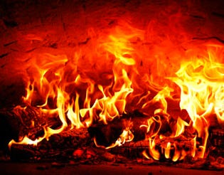 A close-up of a fire

Description automatically generated