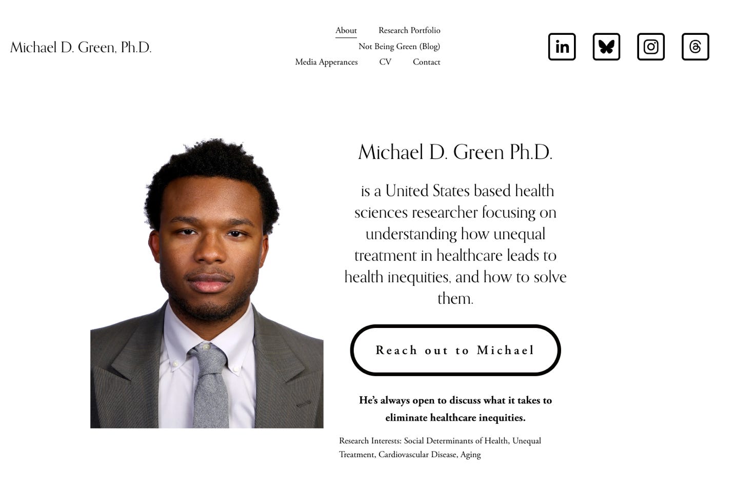 A person in a suit and tie

AI-generated content may be incorrect.