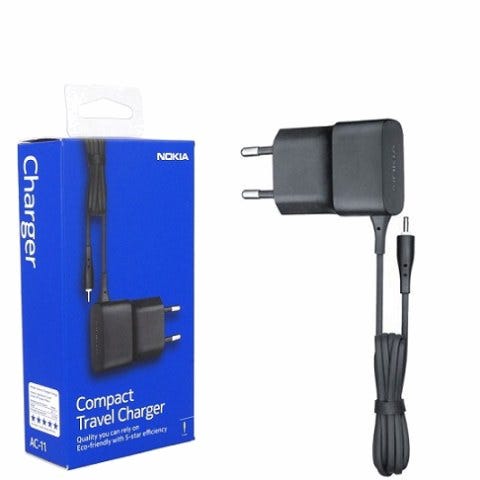 Nokia AC-11 compact travel charger with an EU plug and the old 2mm barrel connector, beside its retail box. Nokia AC-11 compact travel charger with an EU plug and the old 2mm barrel connector, beside its retail box.