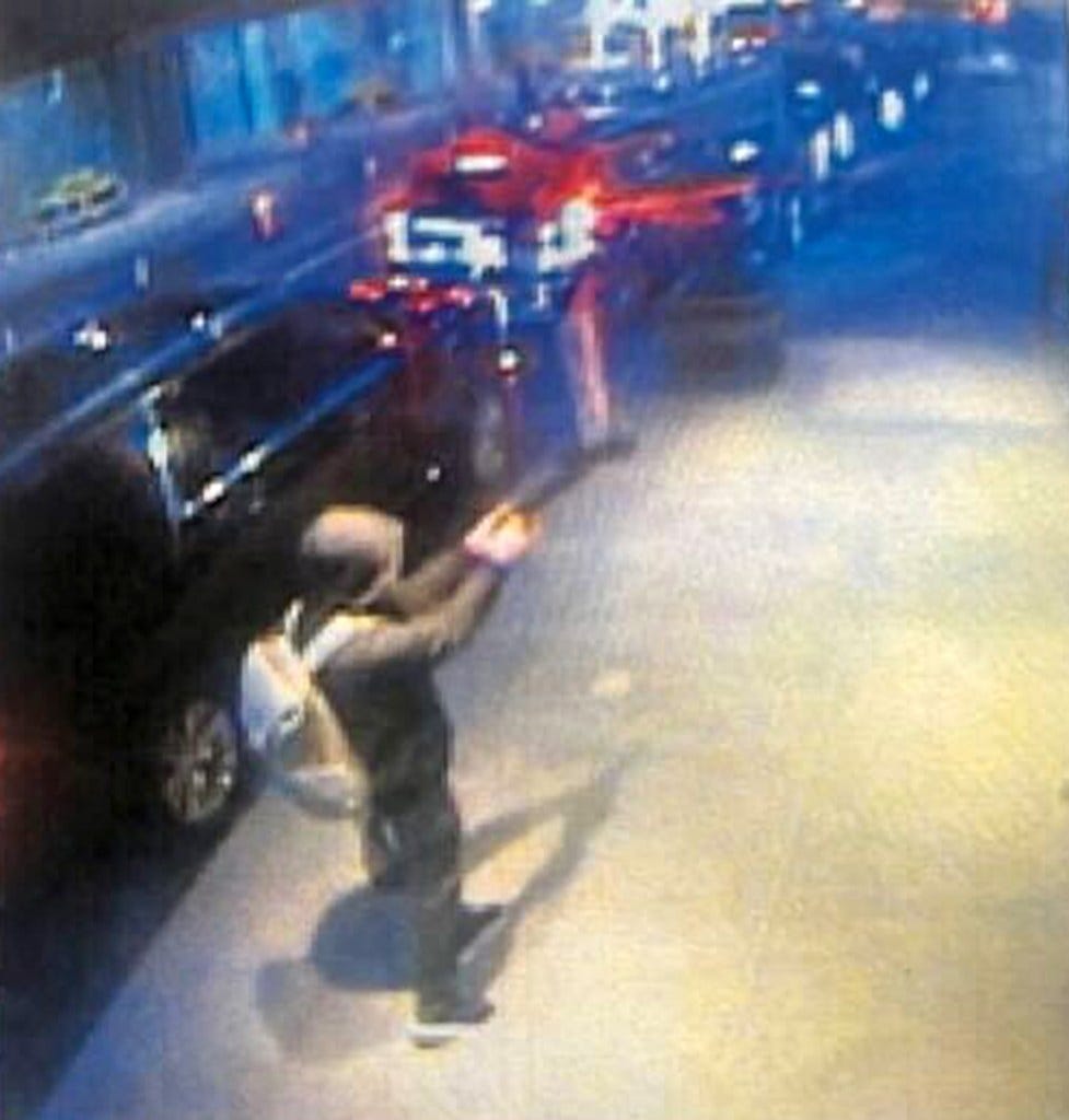 Surveillance footage of Luigi Mangione, a person of interest in a murder, outside the Midtown Hilton Hotel. Surveillance footage of Luigi Mangione, a person of interest in a murder, outside the Midtown Hilton Hotel.