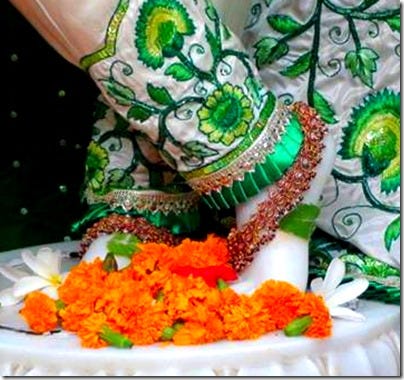 [Krishna's lotus feet]