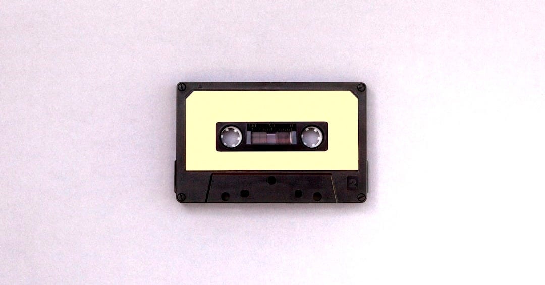 photo of black and brown cassette tape