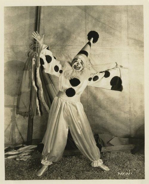 A Pinterest pin added by okidokimacaroni on Aug 17, 2024. The author is Baby Witch Babe. May present: vintage clown pose, pierrot, clown, circus, photography.