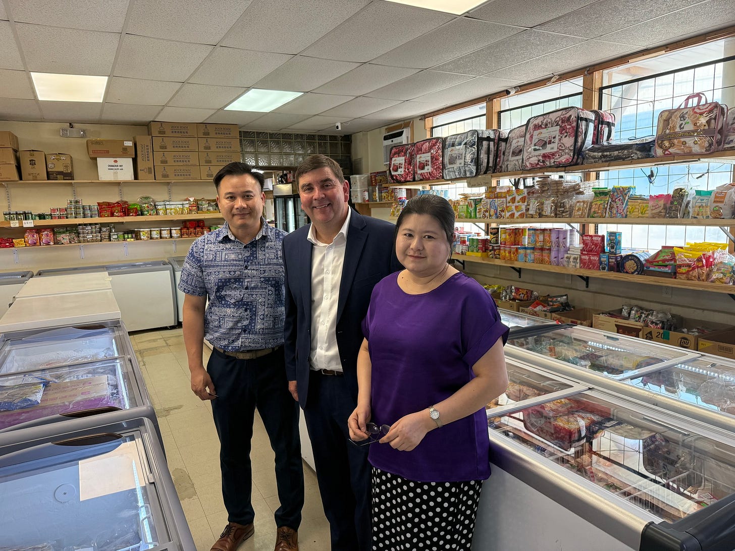 May be an image of 2 people and text