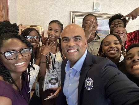 May be an image of 4 people, people smiling and text