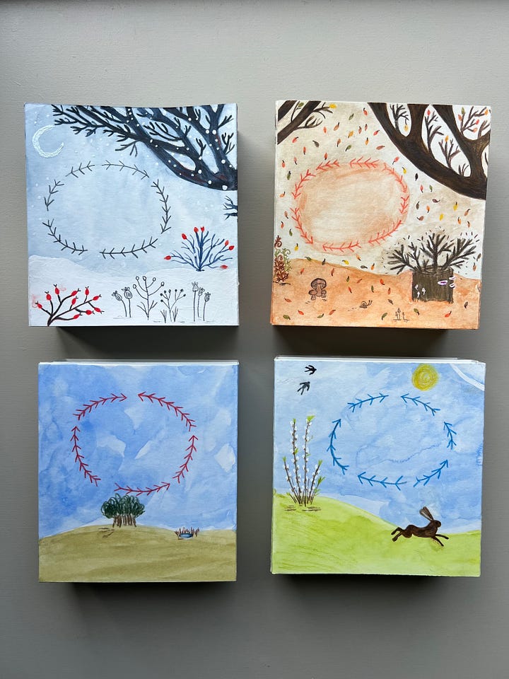 A collection of paper tunnel books handmade depicting the four season illustrated in watercolour and ink