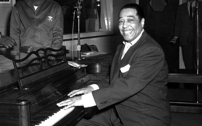 Jazz pianist/composer/bandleader Duke Ellington at his piano.