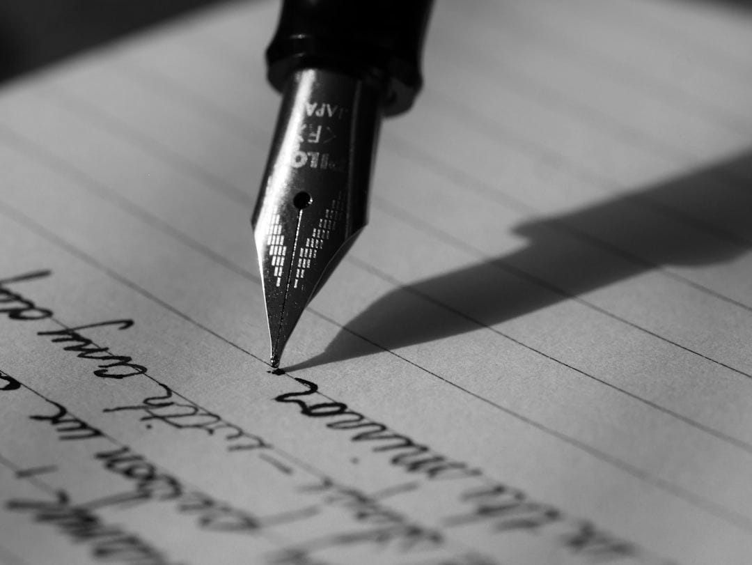fountain pen on black lined paper fountain pen on black lined paper