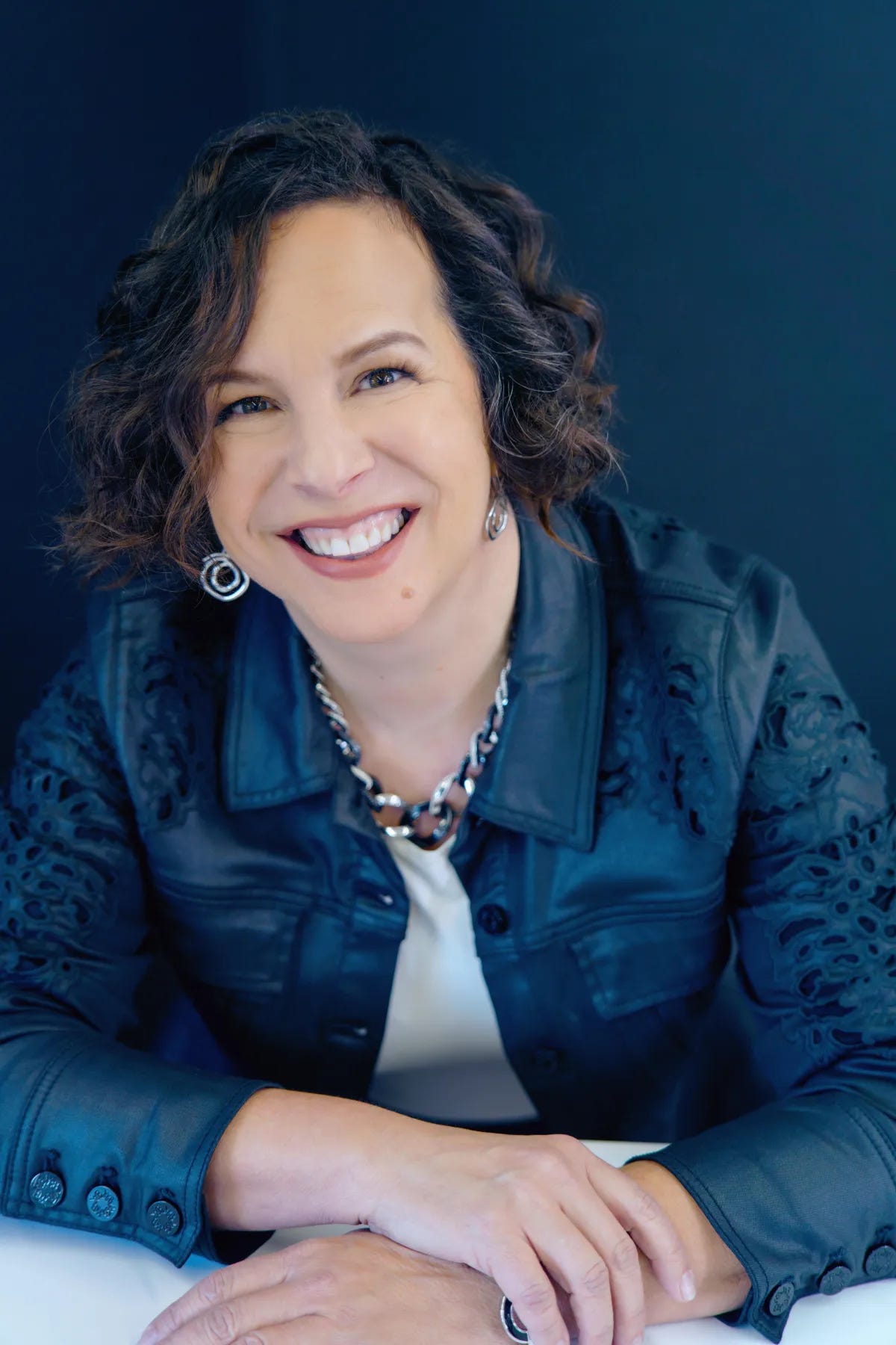 Rachel Burr is an executive coach, leadership consultant, and people expert who blends sharp insight, bold action, and a touch of humor to transform how leaders lead. 