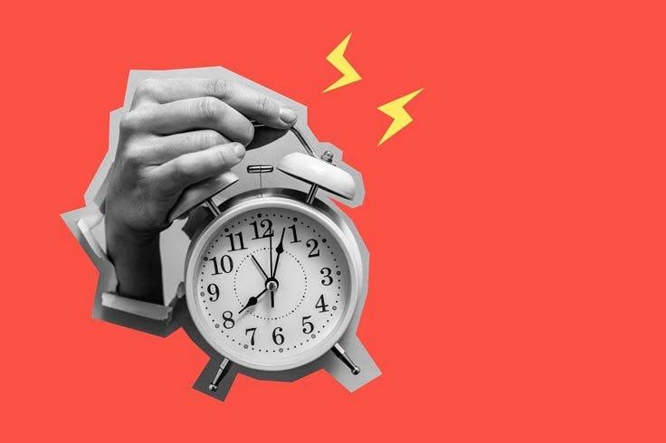 This may contain: a person holding an alarm clock in their hand with a lightning coming out of it This may contain: a person holding an alarm clock in their hand with a lightning coming out of it