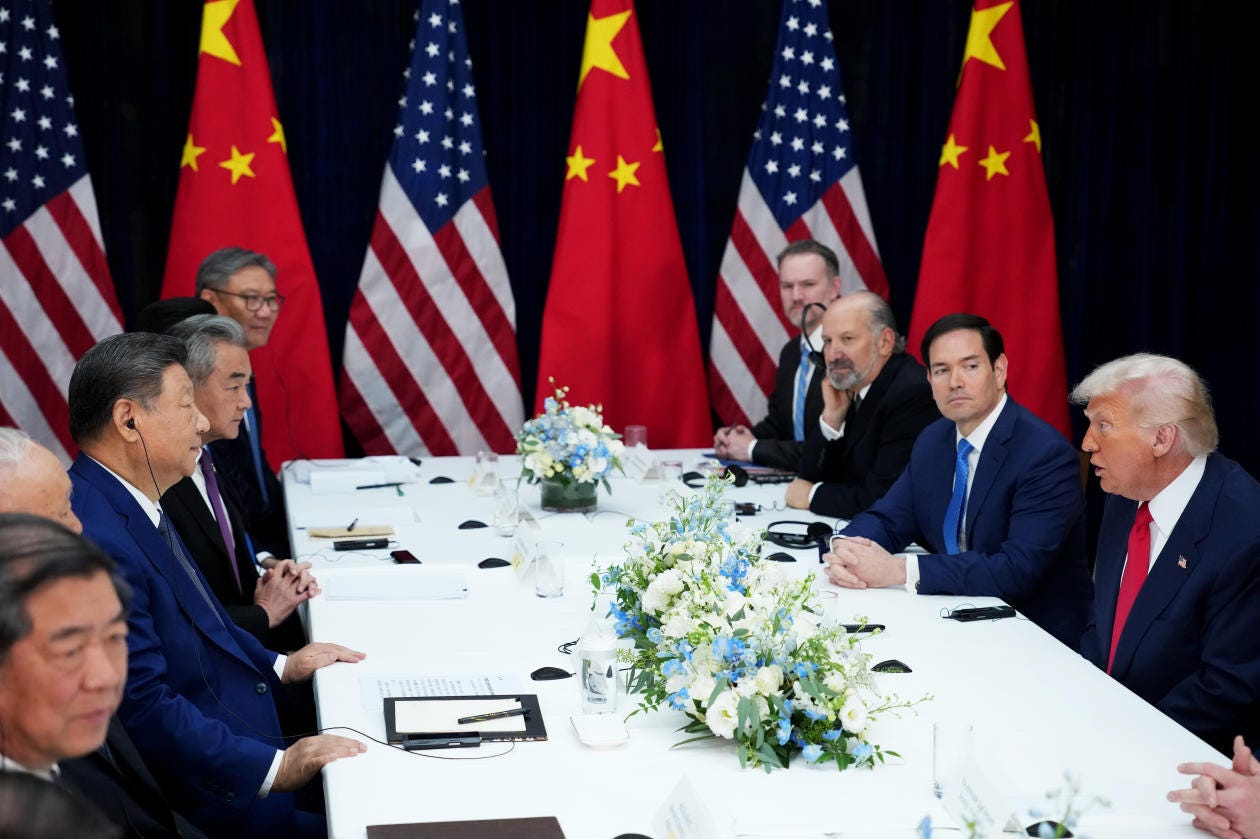 President Trump speaks with Chinese President Xi Jinping during a bilateral meeting.