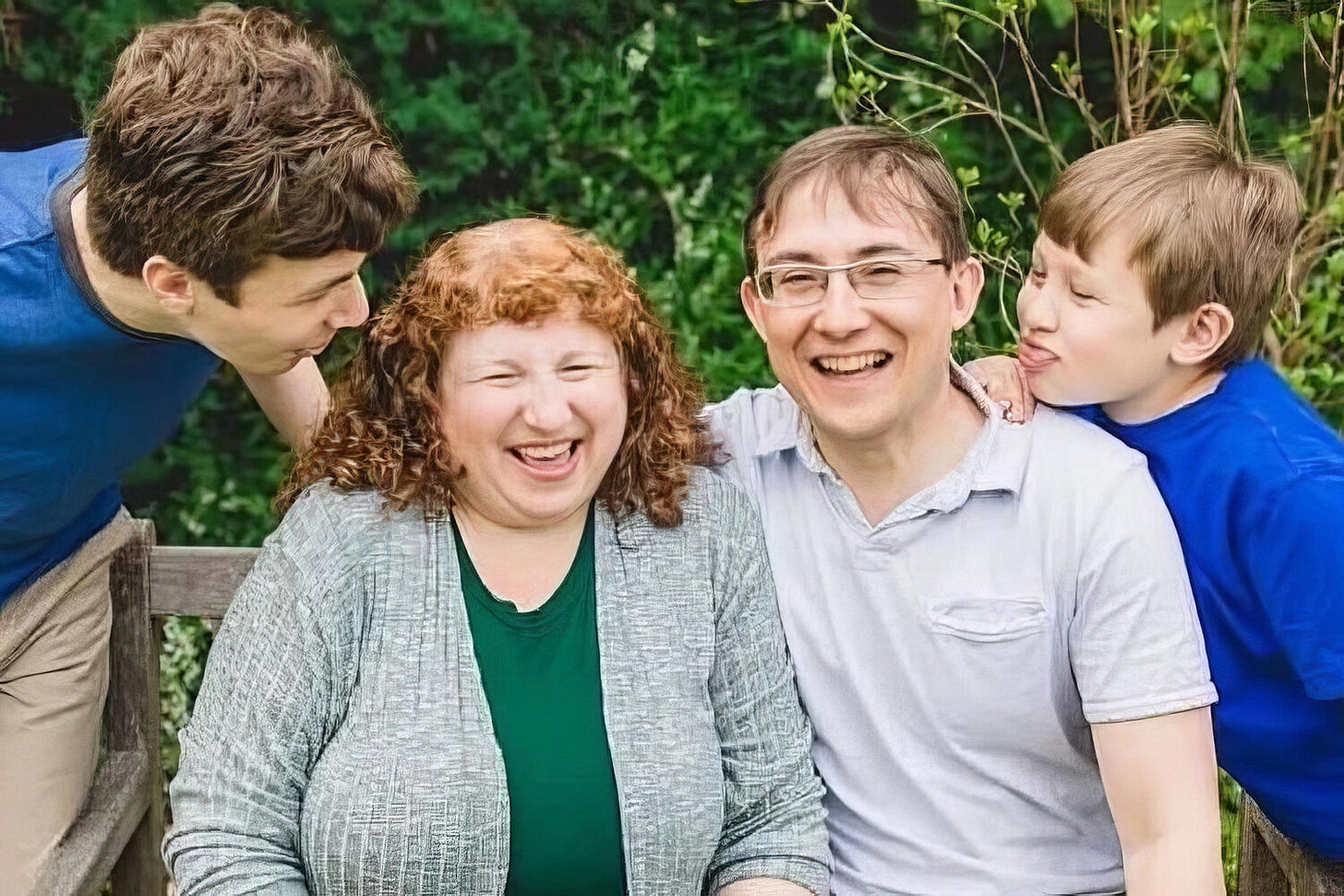 Lauren Wiley with her husband, Jason, and sons, Ben (left), now a student at Penn State University, and Elliot (right), a student at Houston Elementary School.