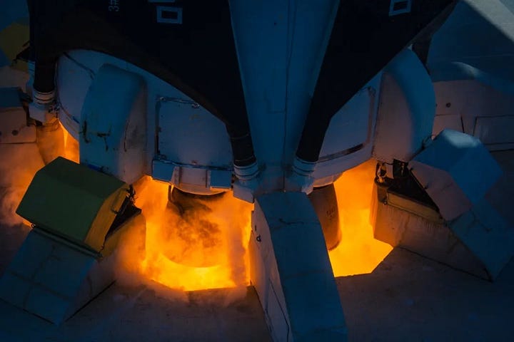 Zhuque-3 Y1 being lifted onto its transport stand after assembly and performing its static fire, landing legs and grid fins are installed.