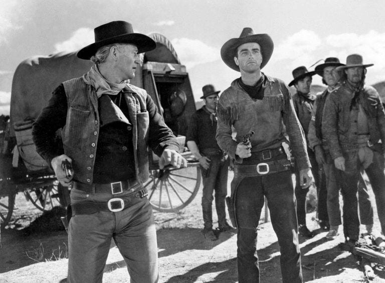 a black and white gunfight scene form an old western movie (conflict resolution and writing