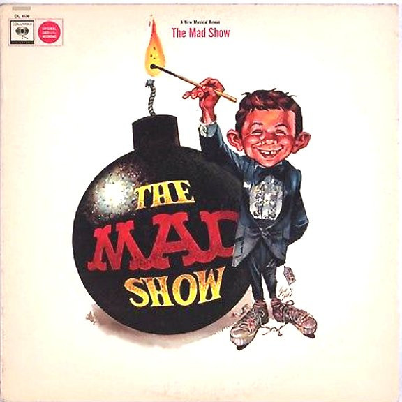 The MAD Show original cast recording vinyl record. The cover is a Jack Davis drawing of Alfred E. Neuman about to light the fuse on a huge bomb with the words "The MAD Show."