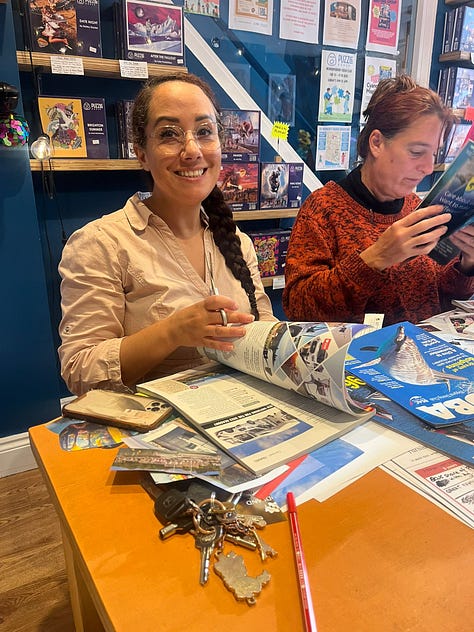 Three event images which include vision boards in progress - a cardboard base with cut out images from various magazines.