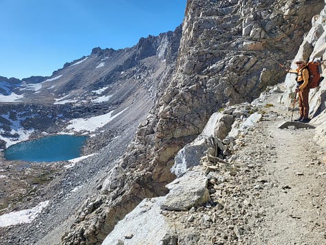 Tall granite mountains with paths leading to sights unknown
