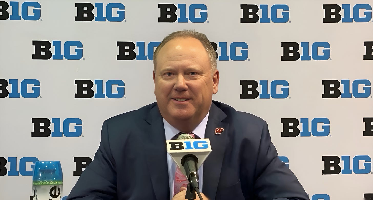 Greg Gard, head coach of the Wisconsin Badgers men’s basketball team, addresses reporters at the podium during Big Ten Media Days. Greg Gard, head coach of the Wisconsin Badgers men’s basketball team, addresses reporters at the podium during Big Ten Media Days.