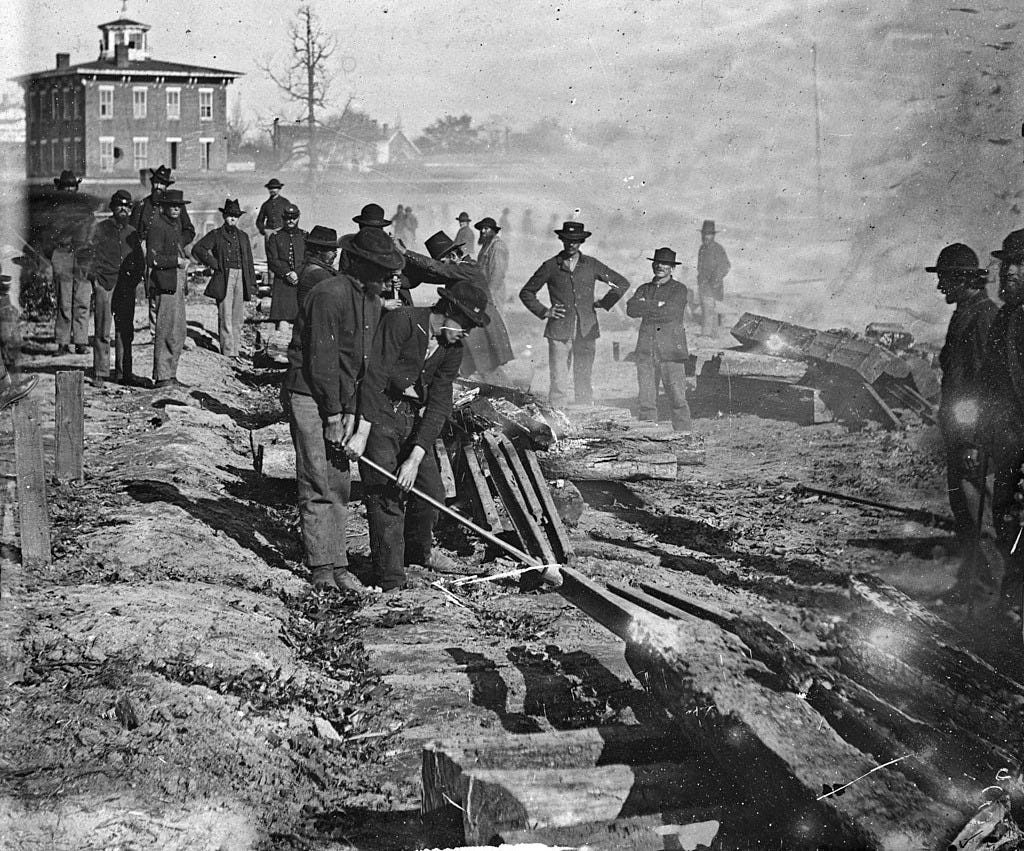 Sherman's men destroying a railroad in Atlanta